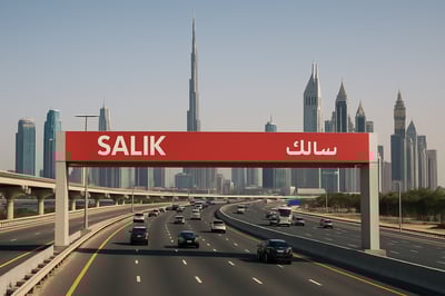 Dubai toll road with Salik gate and city skyline